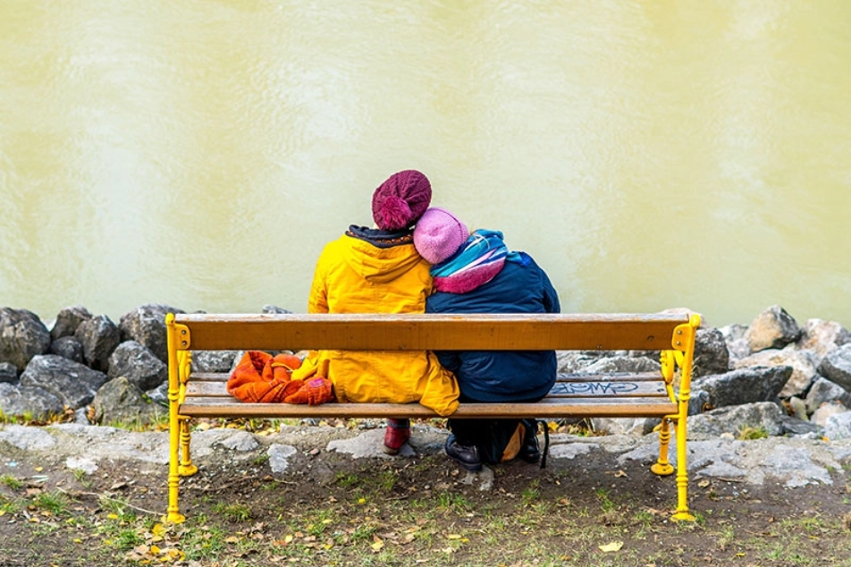 couple sitting on a bench.